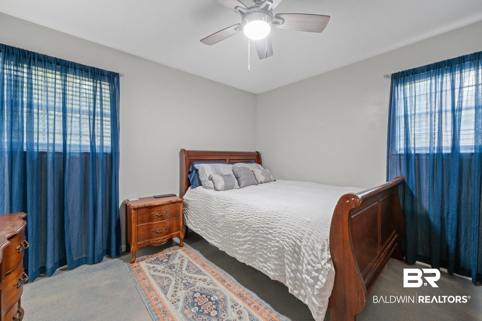 621 Ann Street Saraland, AL 36571 - Photo 9 of 21 Carpeted bedroom featuring ceiling fan