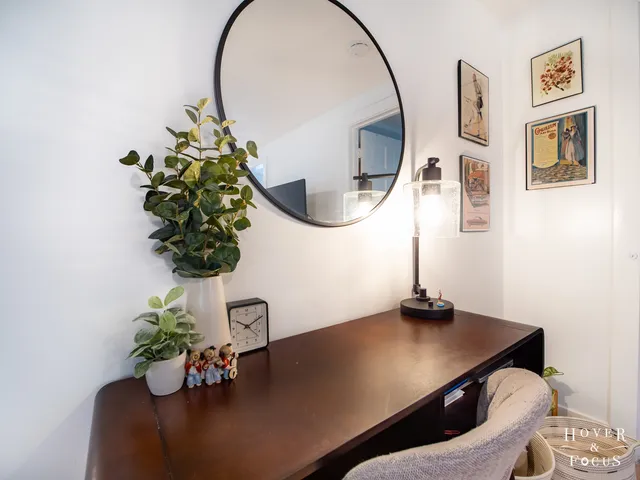 a vase of flowers sitting on a table
