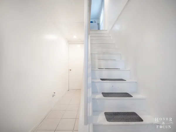 a view of a room with rack on the wall