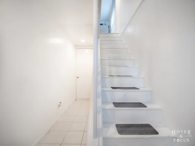 a view of a room with rack on the wall