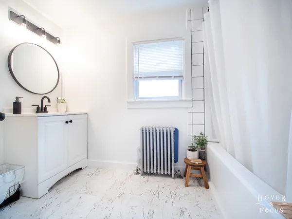 a view of a room that has a table and chair