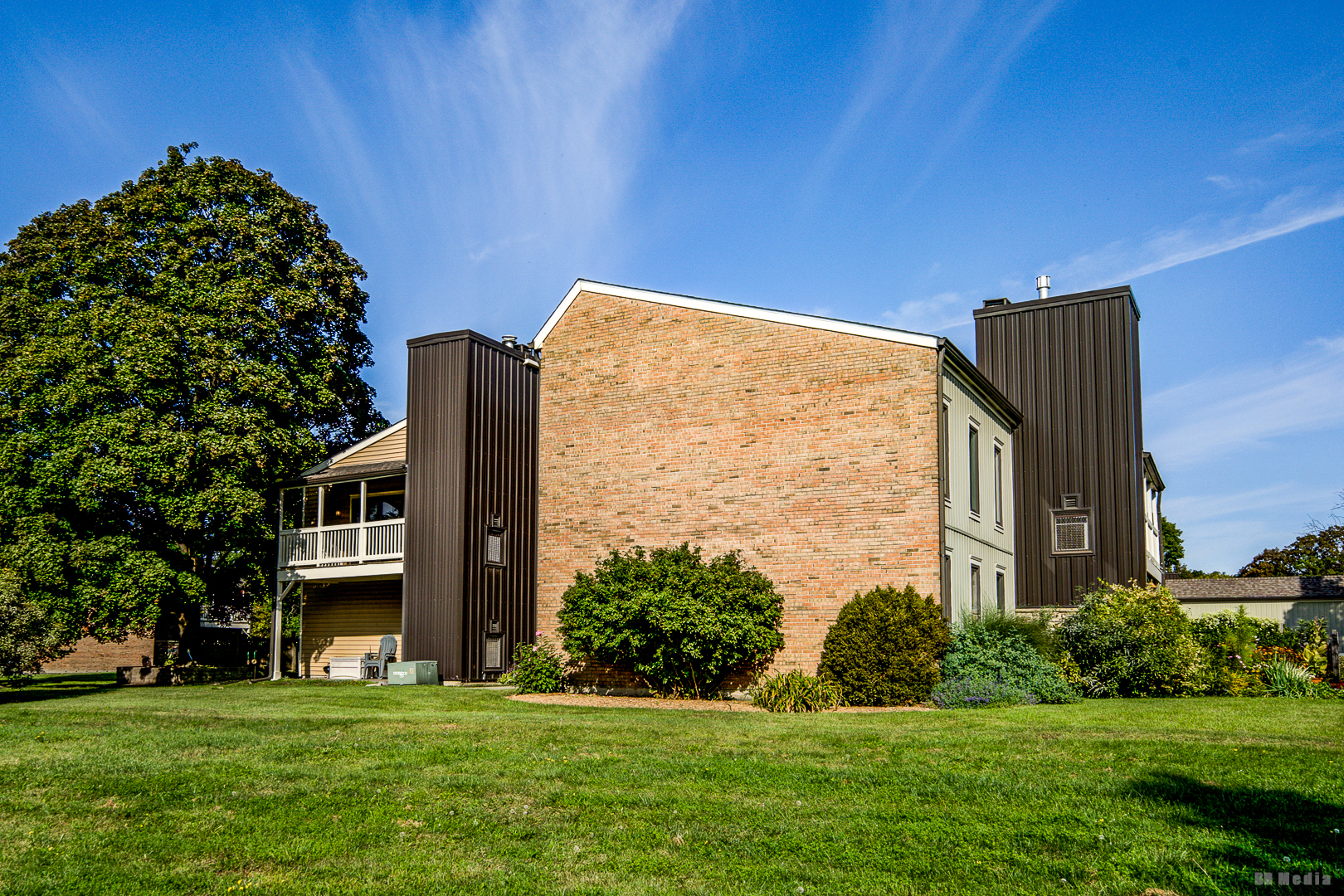 1477 South County Farm Road, Unit 23F Wheaton, IL 60189 - Photo 23 of 27 a front view of building with yard
