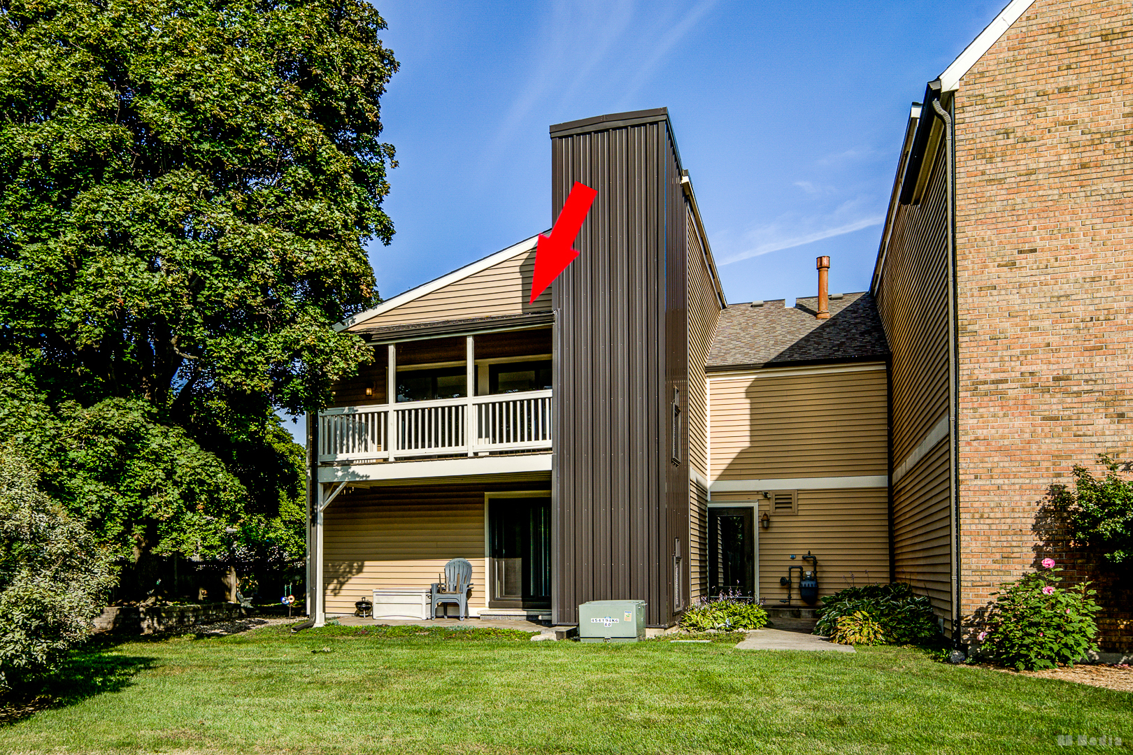 1477 South County Farm Road, Unit 23F Wheaton, IL 60189 - Photo 10 of 27 a view of a house with a sink and a yard
