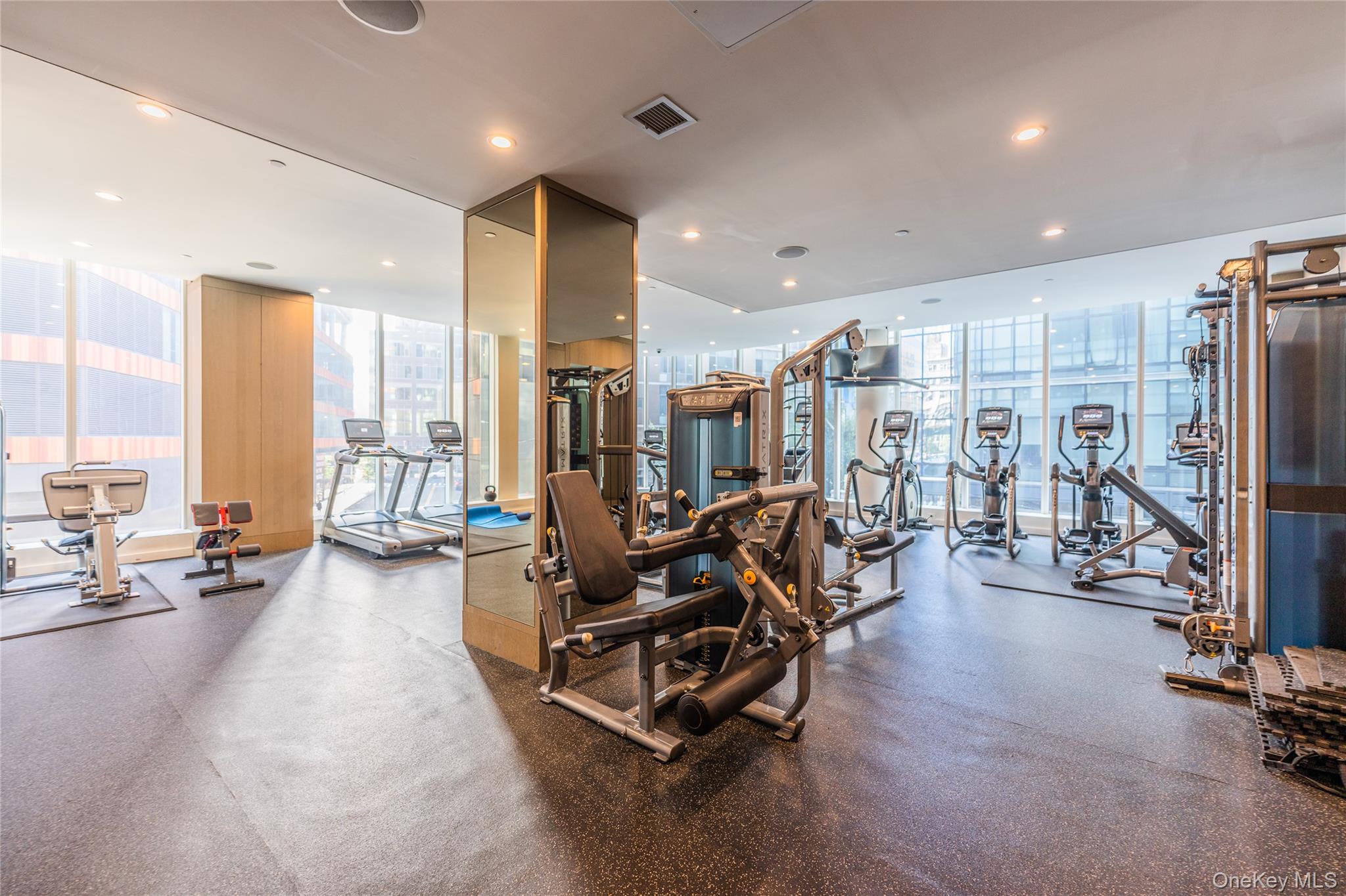 27-17 42nd Road, Unit 7E Queens, NY 11101 - Photo 25 of 42 a view of a room with gym equipment