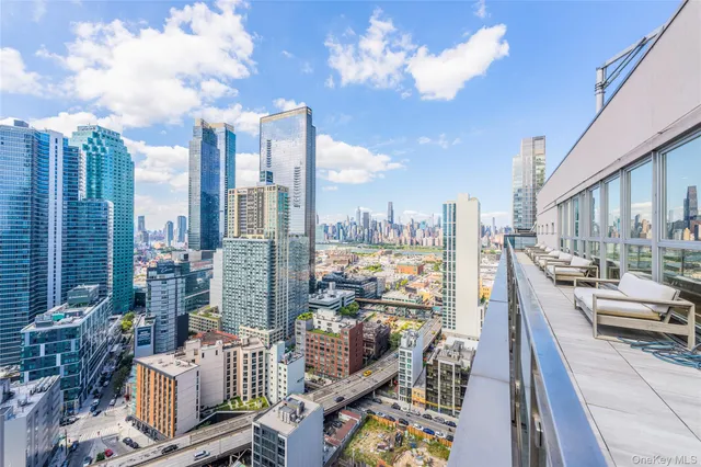 a view of balcony with furniture