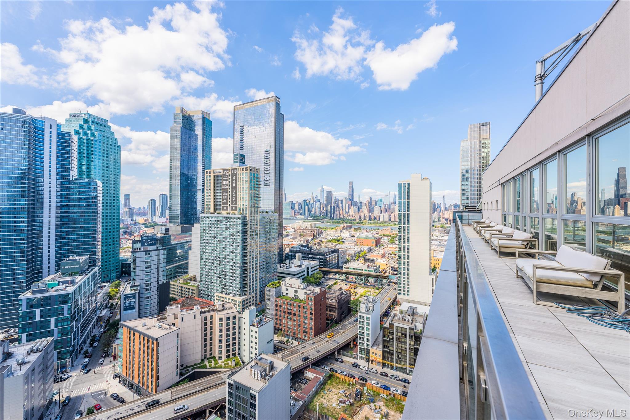 27-17 42nd Road, Unit 7E Queens, NY 11101 - Photo 30 of 42 a view of balcony with furniture