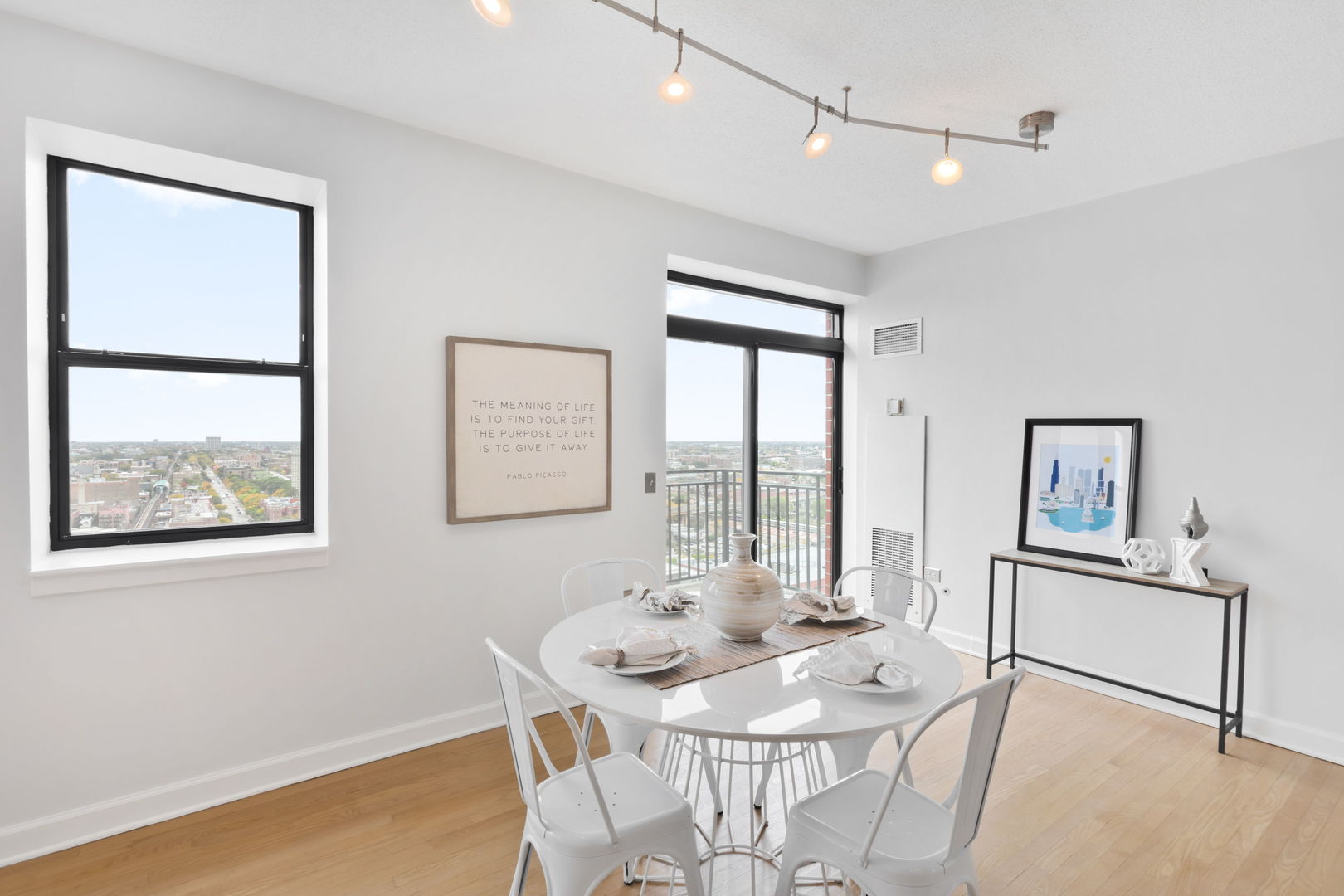1529 South State Street, Unit 22K Chicago, IL 60605 - Photo 5 of 20 a view of a dining room with furniture and a window