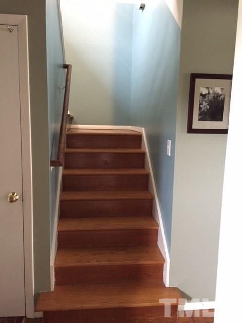 5141 Revere Road, Unit 23 Durham, NC 27713 - Photo 12 of 20 a view of staircase with white walls and black wall