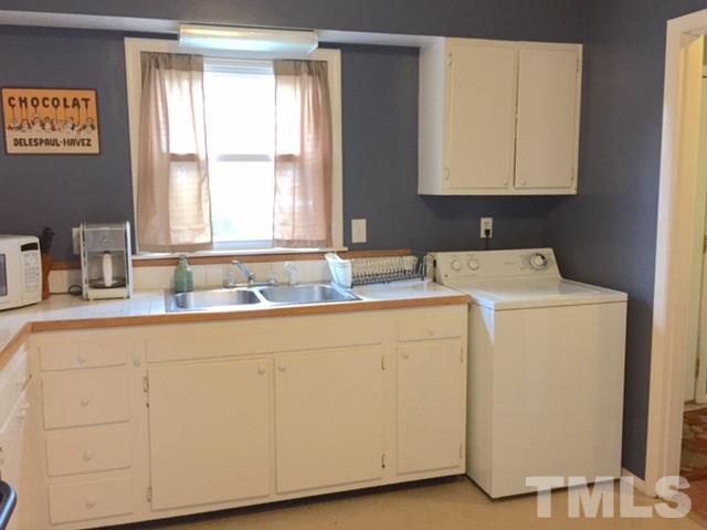 5141 Revere Road, Unit 23 Durham, NC 27713 - Photo 6 of 20 a utility room with dryer and washer