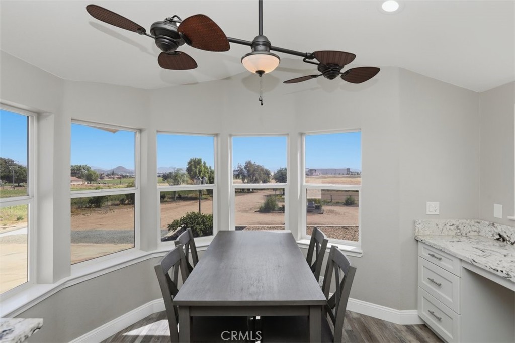 33634 Howard Way Menifee, CA 92584 - Photo 17 of 53 a view of a dining room with furniture window and outside view