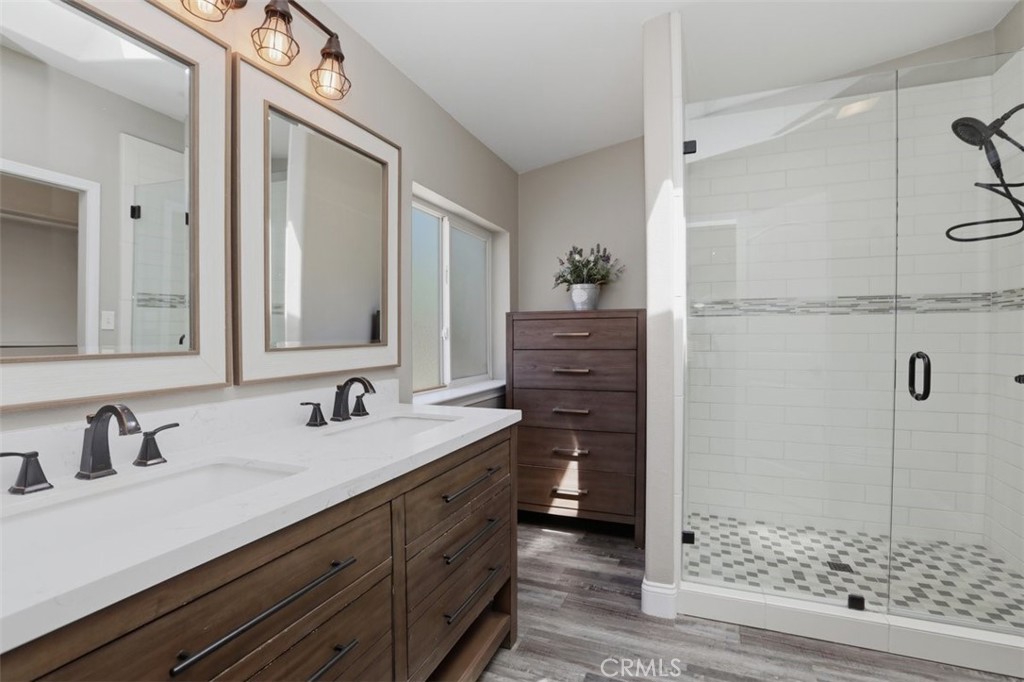 33634 Howard Way Menifee, CA 92584 - Photo 24 of 53 a bathroom with a sink and a mirror