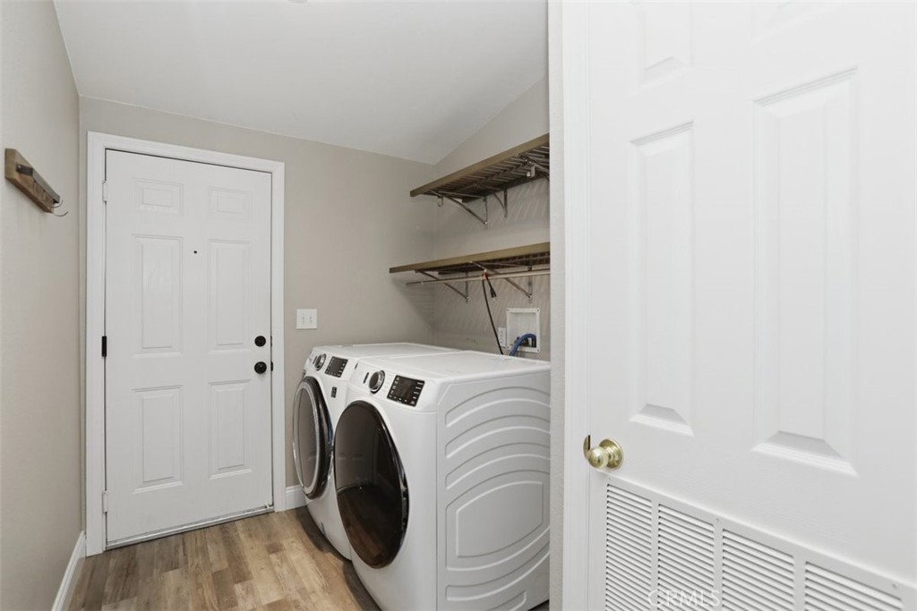 33634 Howard Way Menifee, CA 92584 - Photo 29 of 53 a view of utility room with washer and dryer