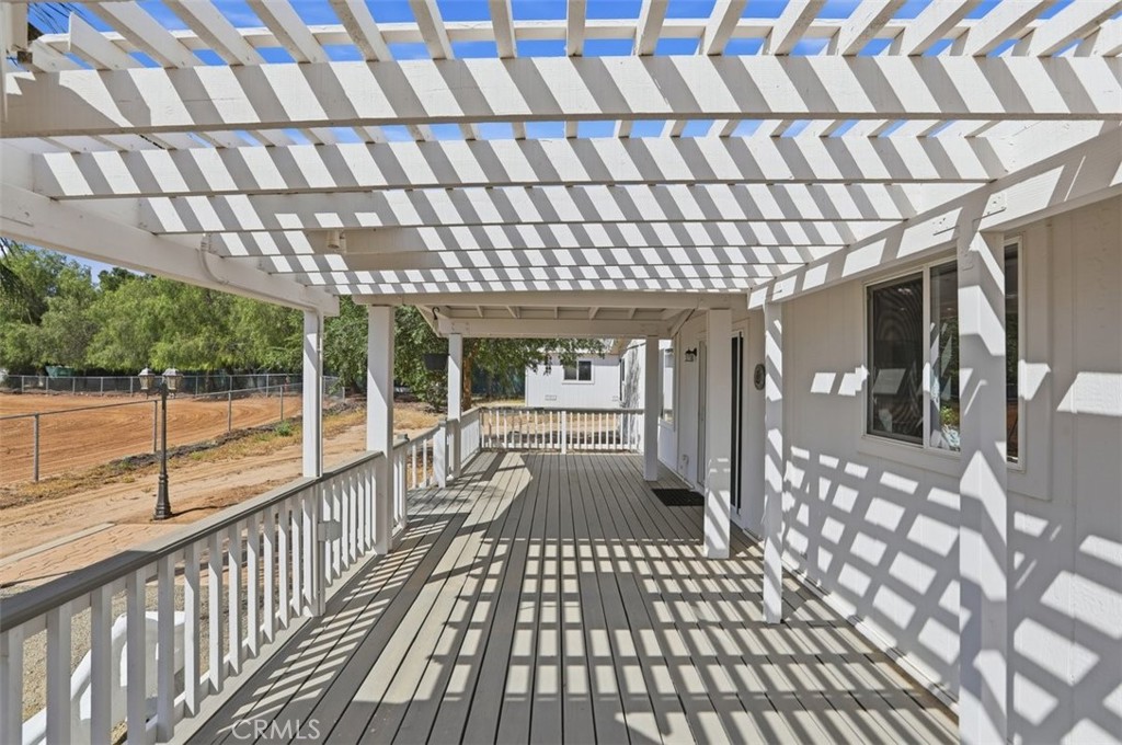 33634 Howard Way Menifee, CA 92584 - Photo 32 of 53 a view of a porch with wooden floor