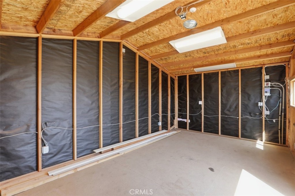 33634 Howard Way Menifee, CA 92584 - Photo 40 of 53 a view of an empty room with a iron stairs