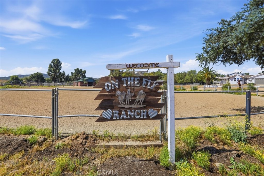 33634 Howard Way Menifee, CA 92584 - Photo 6 of 53 a view of a street with a building in the background