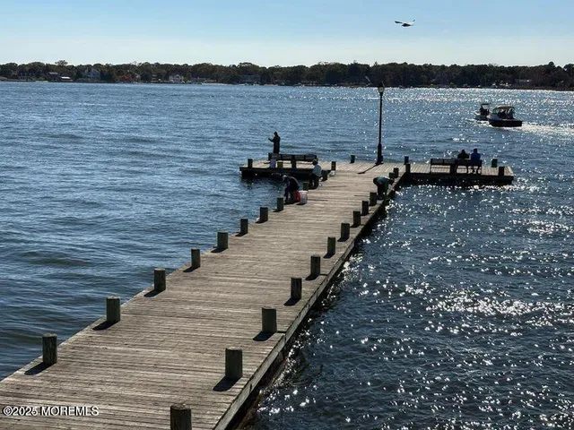a lake view with mountain view