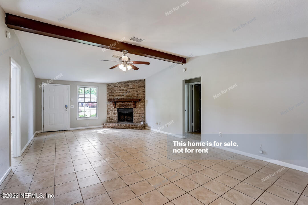 1663 Rhonda Drive Middleburg, FL 32068 - Photo 6 of 24 a view of a livingroom with a staircase