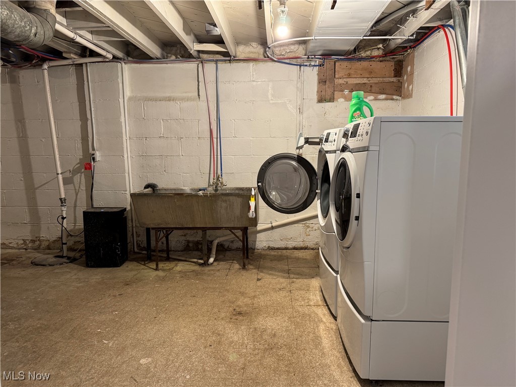 1139 Kessel Avenue Akron, OH 44310 - Photo 12 of 36 Clothes washing area with separate washer and dryer