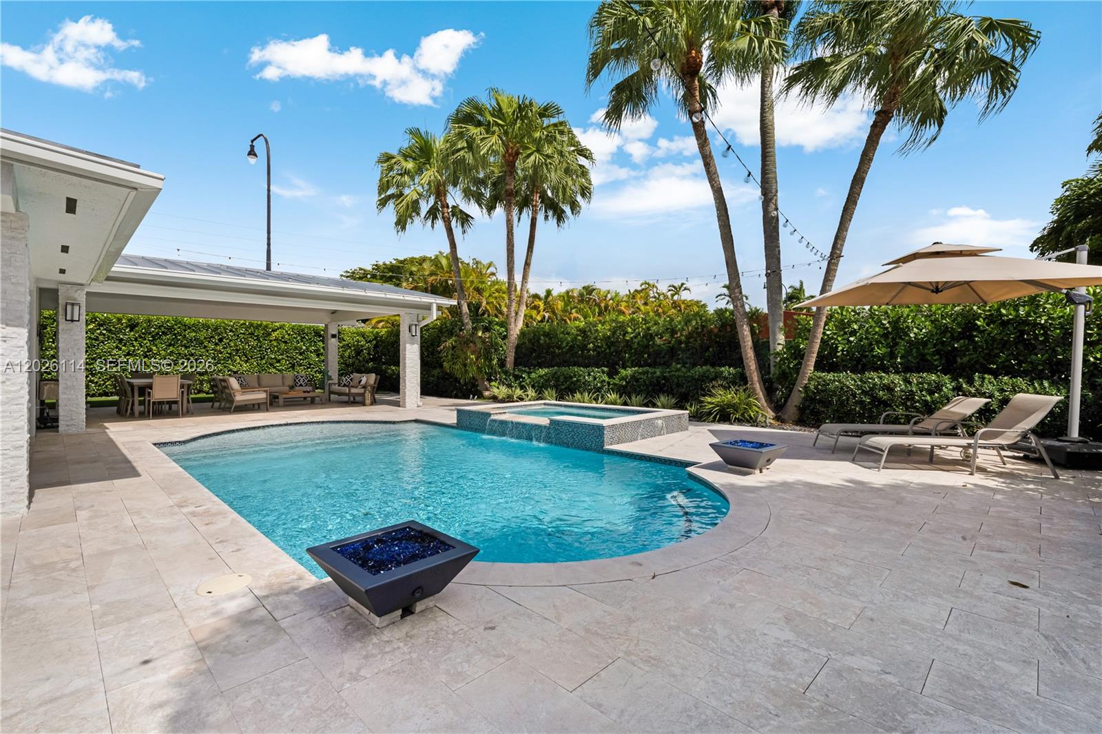 9641 Southwest 66th Street Miami, FL 33173 - Photo 47 of 57 a view of a backyard with swimming pool