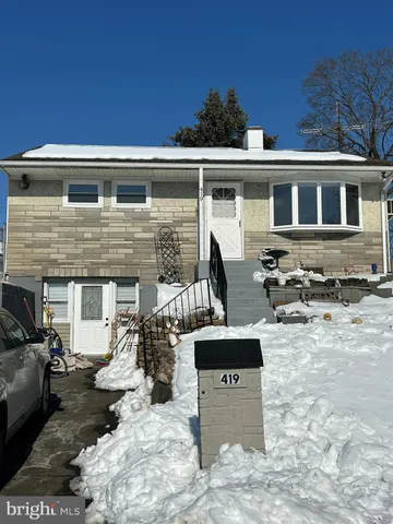 a front view of a house with patio