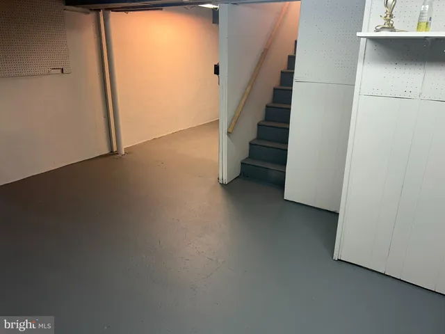 a view of a hallway with staircase