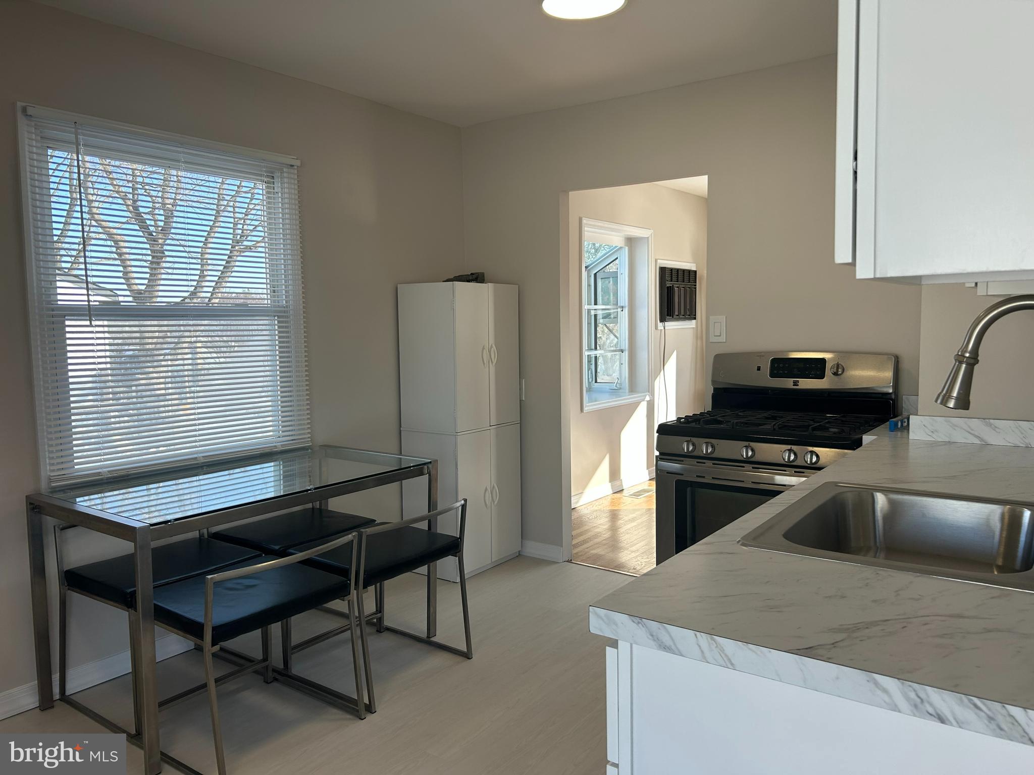 419 Temple Road Southampton, PA 18966 - Photo 3 of 12 a kitchen with a stove a refrigerator and a sink