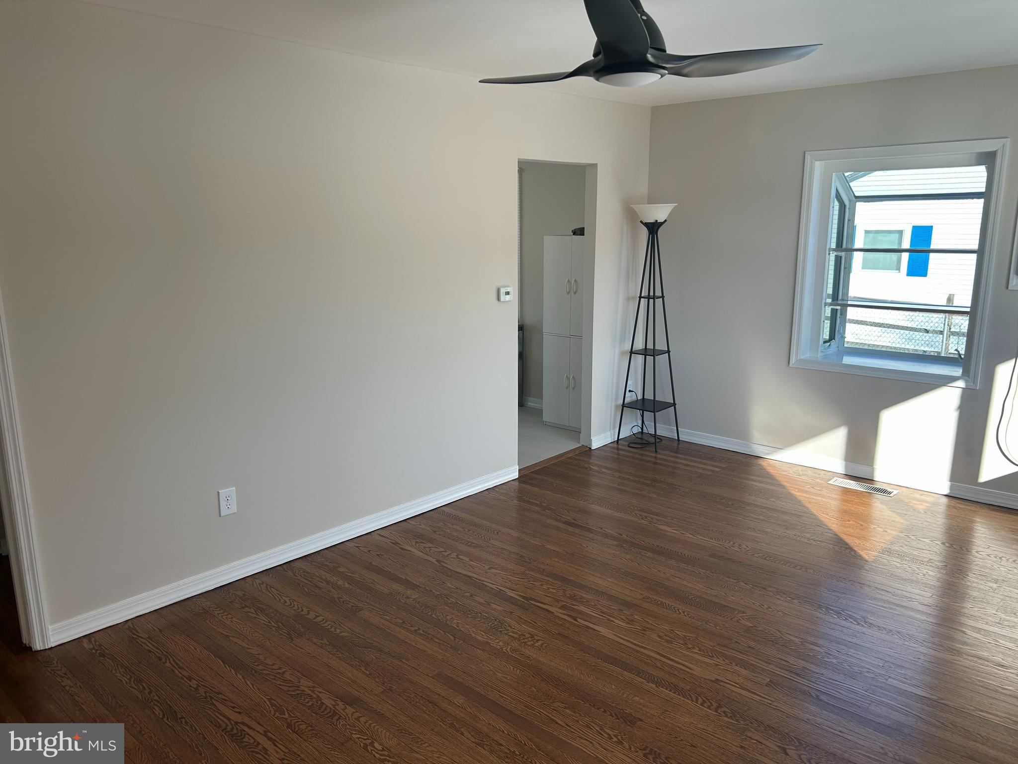 419 Temple Road Southampton, PA 18966 - Photo 5 of 12 a view of empty room with wooden floor and fan