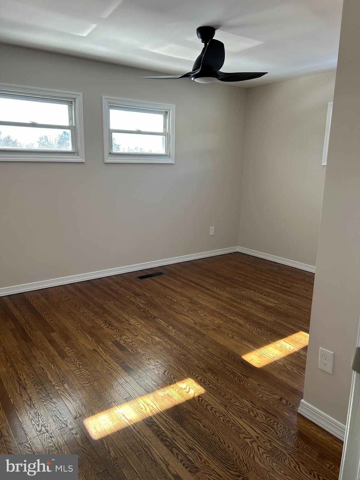 419 Temple Road Southampton, PA 18966 - Photo 7 of 12 a view of empty room with wooden floor