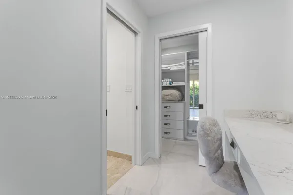 a view of an empty walk in closet