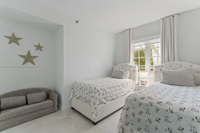 a hallway with seating area