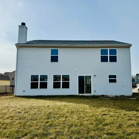 a house view with a backyard