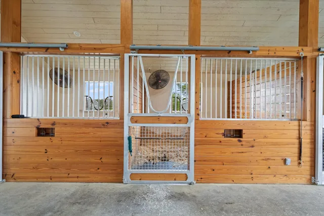 a view of pool and trees in the background