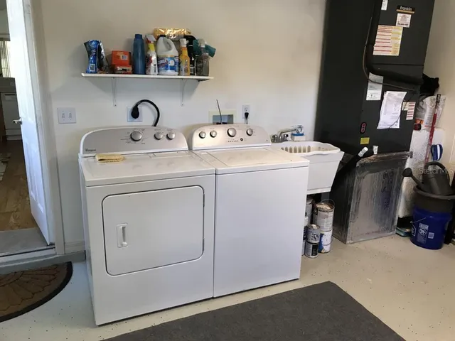 a utility room with dryer and washer