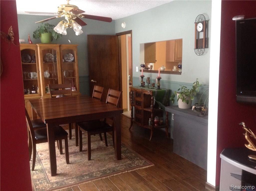 5588 East Clyde Road Howell, MI 48855 - Photo 6 of 19 Formal dining room off of kitchen