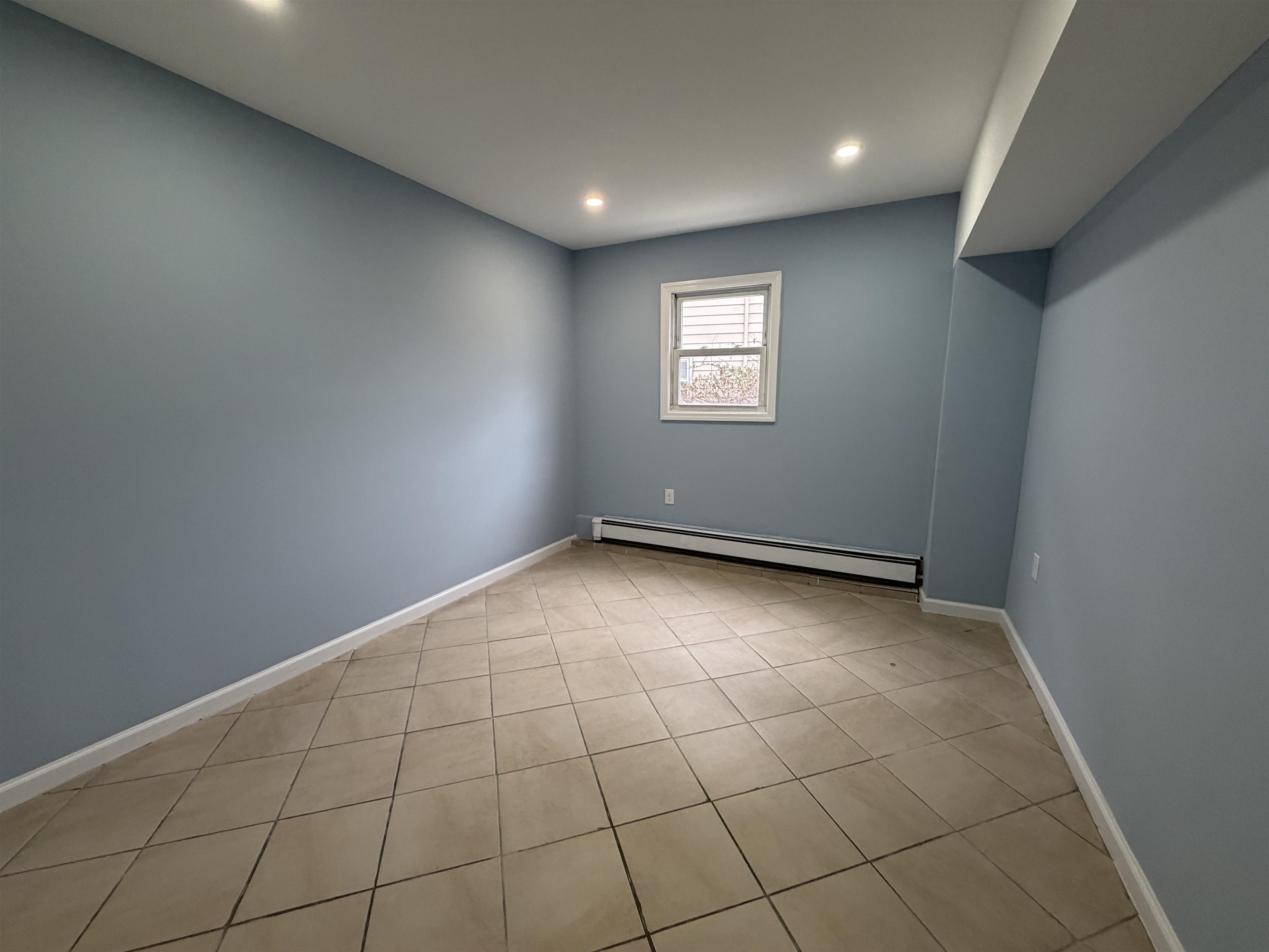 14 Acorn Road, Unit 1 Secaucus, NJ 07094 - Photo 7 of 14 an empty room with windows