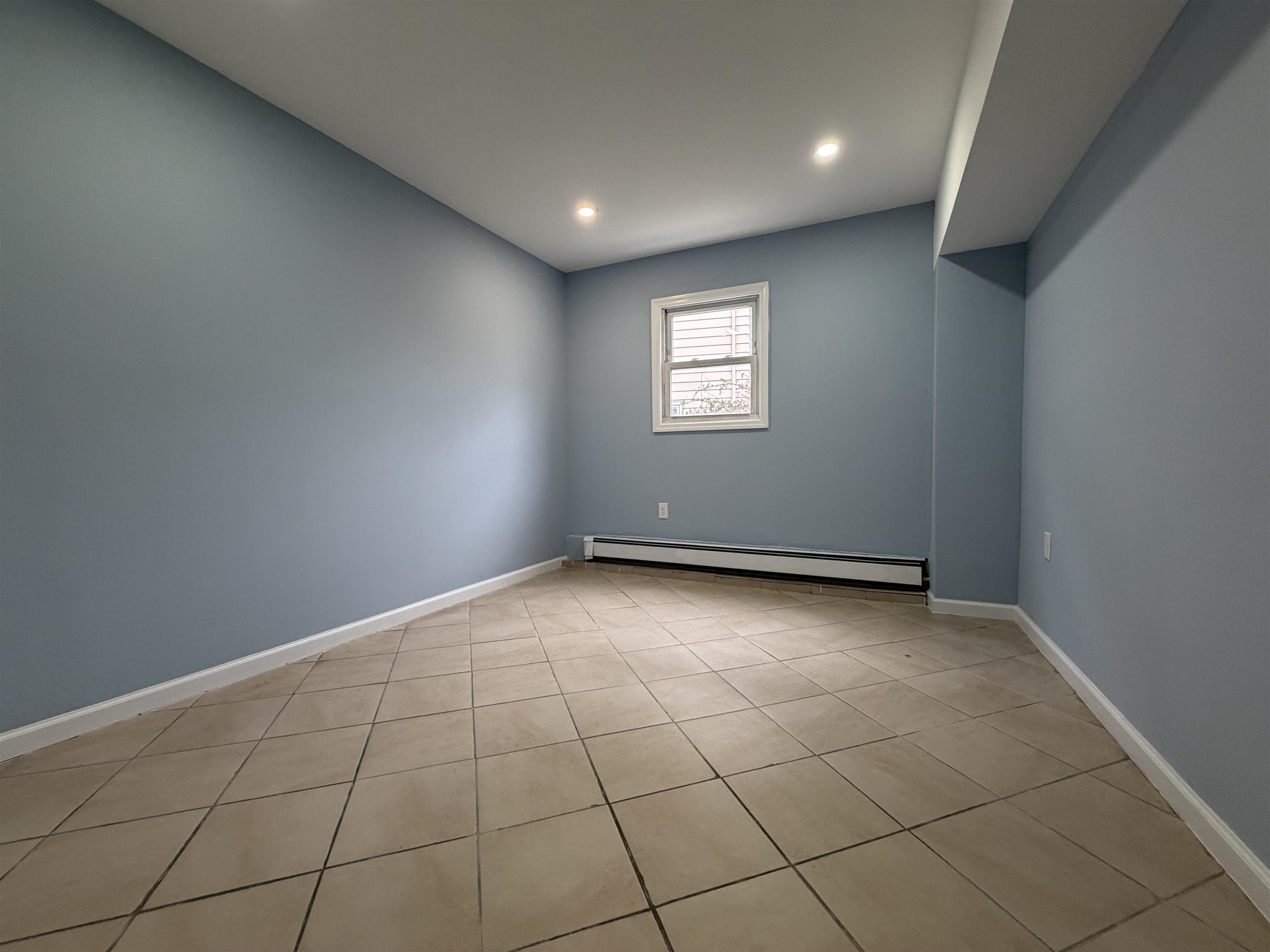 14 Acorn Road, Unit 1 Secaucus, NJ 07094 - Photo 8 of 14 a view of an empty room with a window