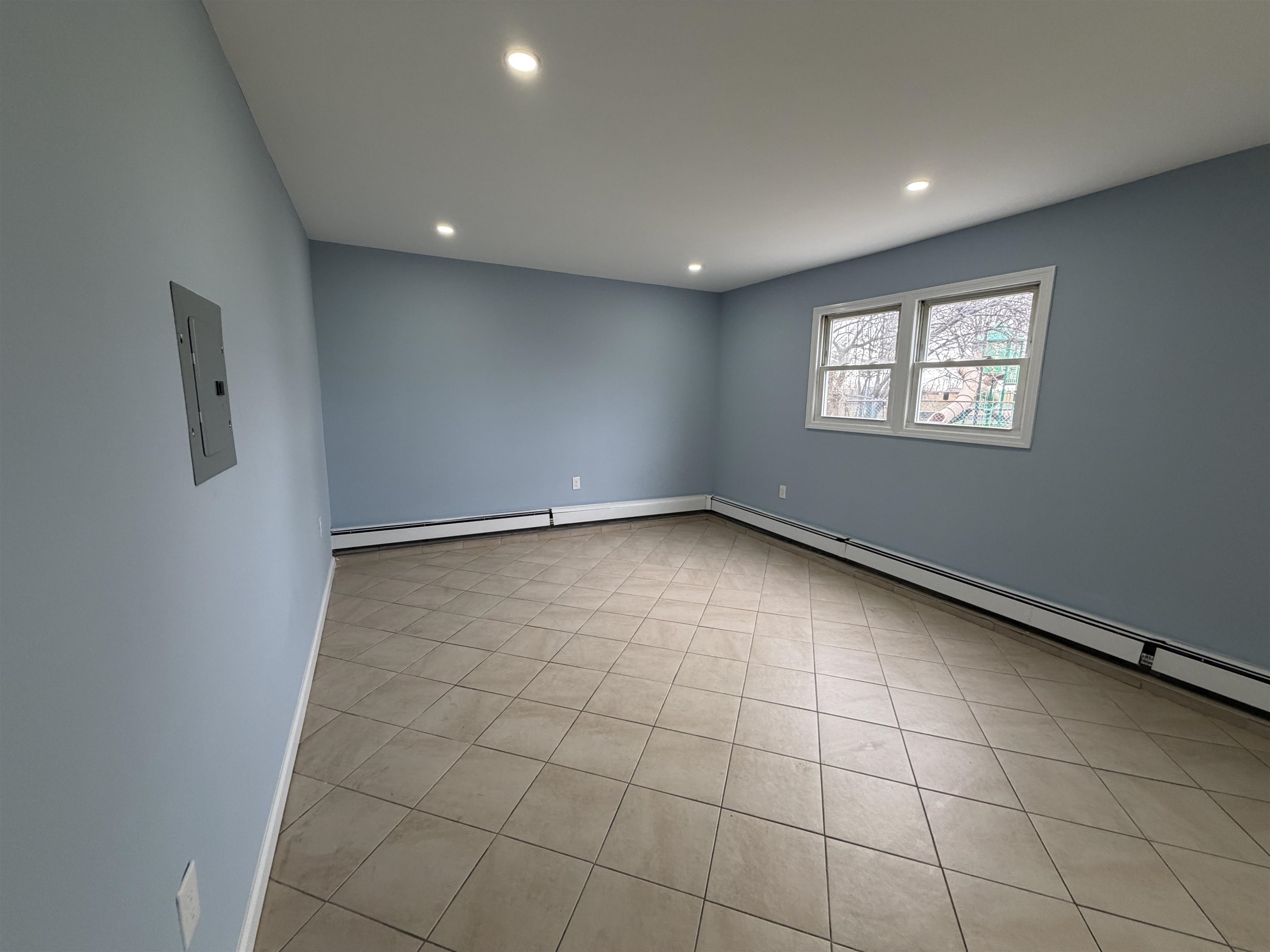 14 Acorn Road, Unit 1 Secaucus, NJ 07094 - Photo 9 of 14 a view of an empty room with a window