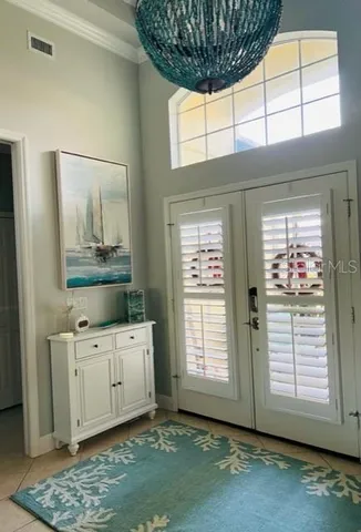 a living room with furniture rug and window