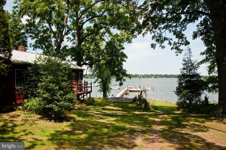 VIEW OF MAIN COTTAGE FROM TOP OF PROPERTY