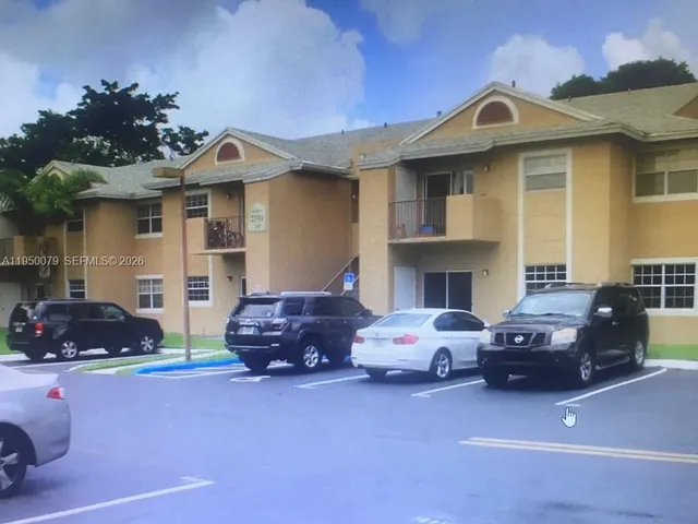 a car parked in front of a house