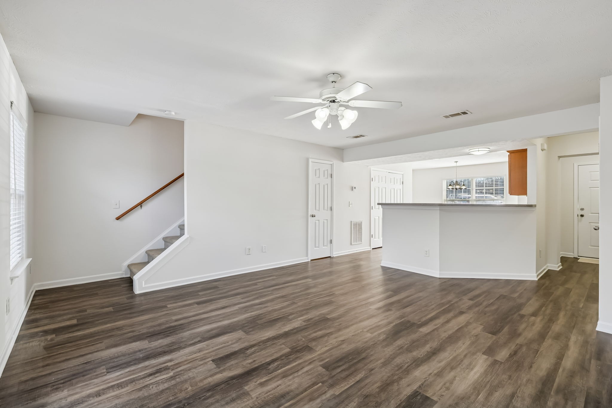 1791 Red Jacket Drive Antioch, TN 37013 - Photo 11 of 48 a view of empty room with wooden floor and fan