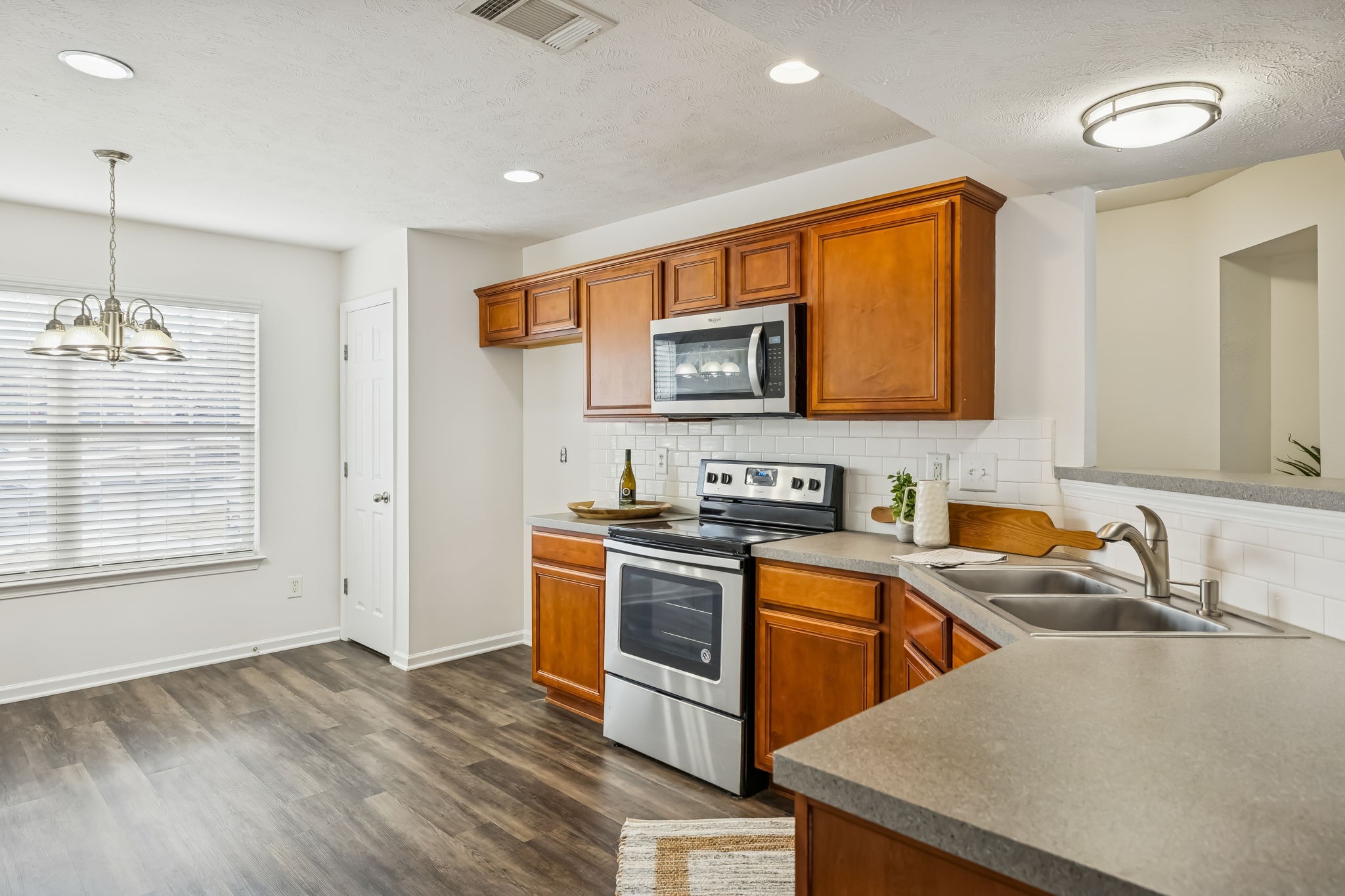 1791 Red Jacket Drive Antioch, TN 37013 - Photo 16 of 48 a kitchen that has a sink and a stove in it