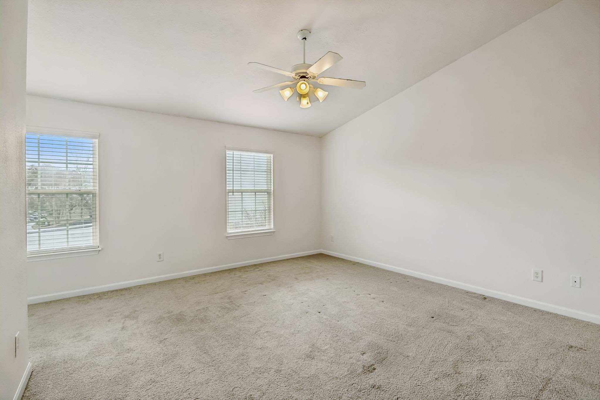1791 Red Jacket Drive Antioch, TN 37013 - Photo 24 of 48 an empty room with windows and chandelier fan