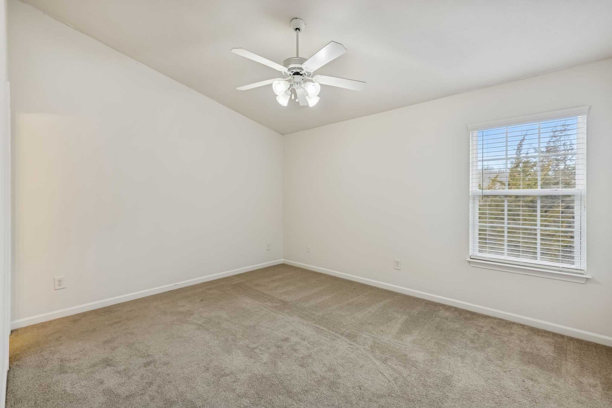 1791 Red Jacket Drive Antioch, TN 37013 - Photo 32 of 48 an empty room with a window and a fan