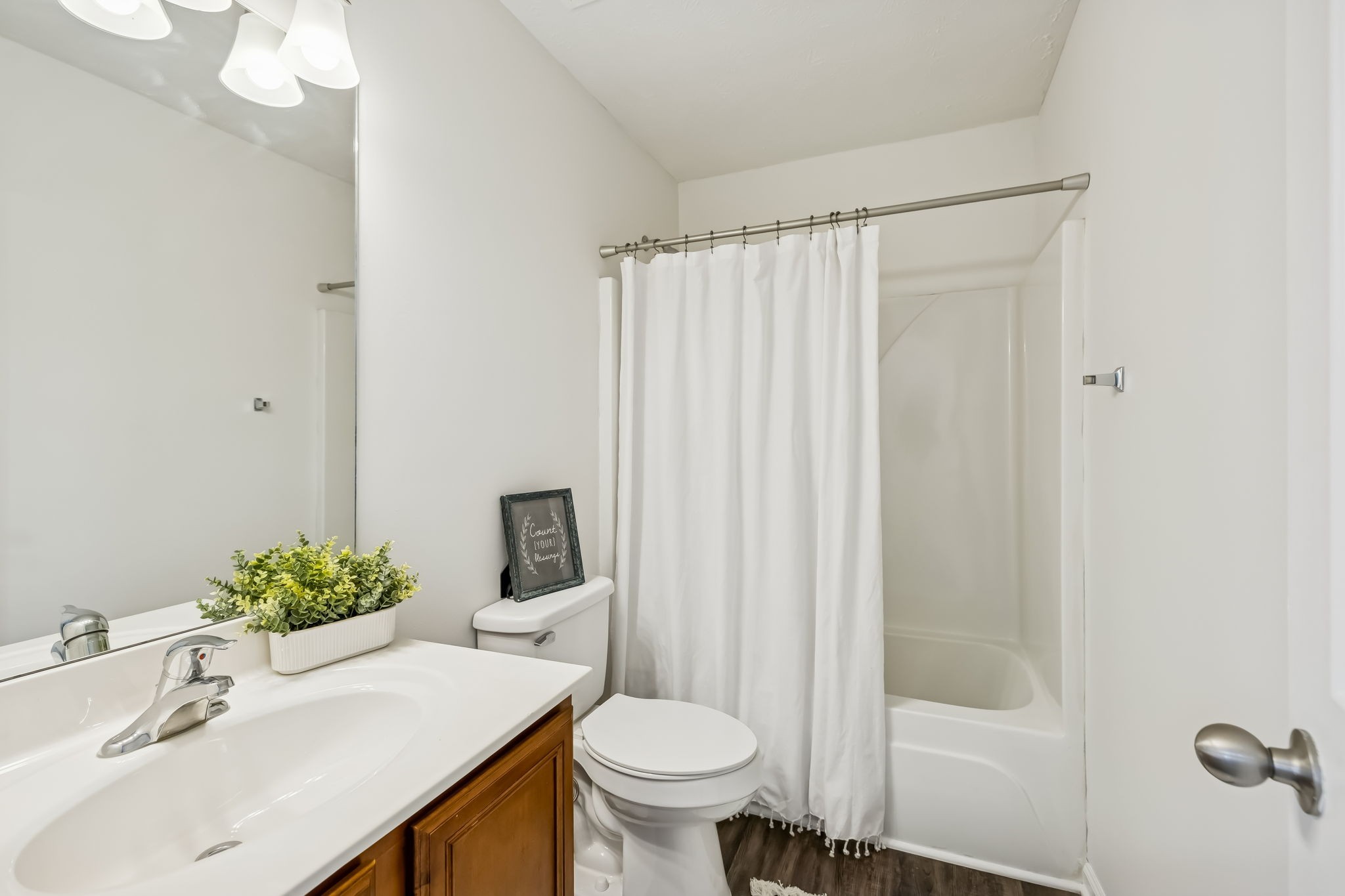1791 Red Jacket Drive Antioch, TN 37013 - Photo 34 of 48 a bathroom with a sink toilet and shower