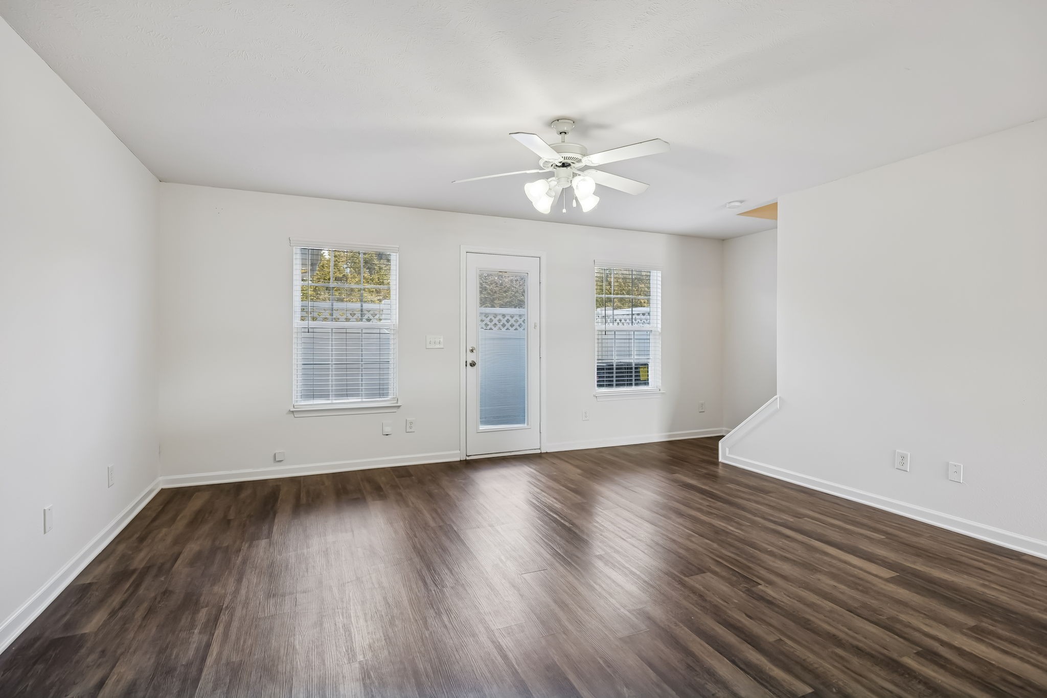 1791 Red Jacket Drive Antioch, TN 37013 - Photo 8 of 48 a view of an empty room with wooden floor and a window