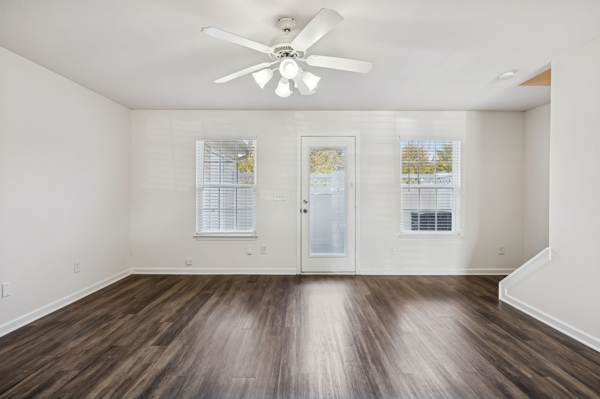 1791 Red Jacket Drive Antioch, TN 37013 - Photo 9 of 48 a view of wooden floor and a chandelier fan in a room