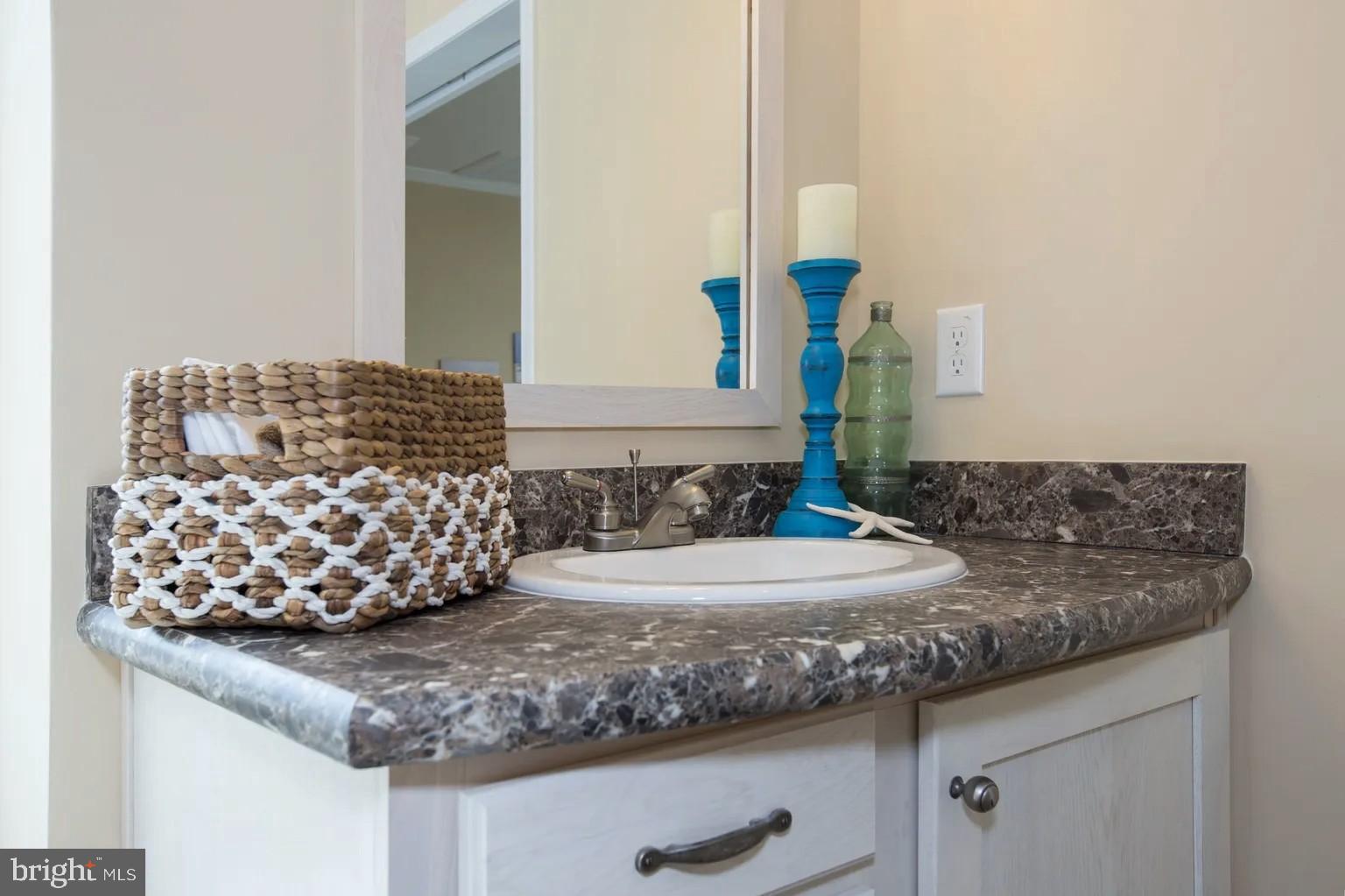 0 Cross County Road Mineral, VA 23117 - Photo 13 of 21 a bathroom with a granite countertop sink and a mirror