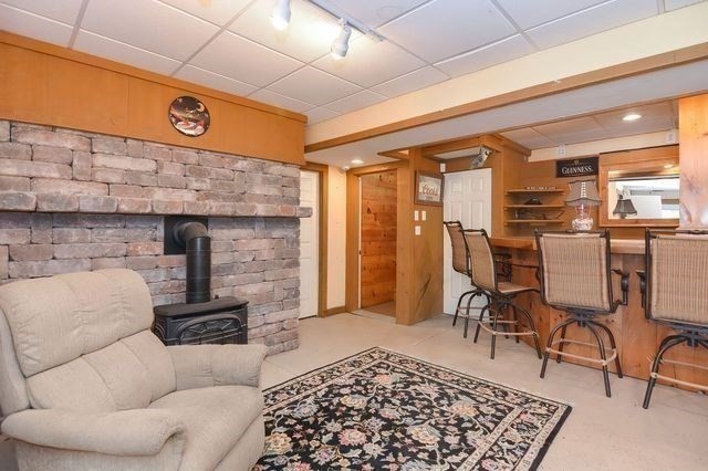 127 Haverhill Road Amesbury, MA 01913 - Photo 26 of 42 a living room with furniture and a rug