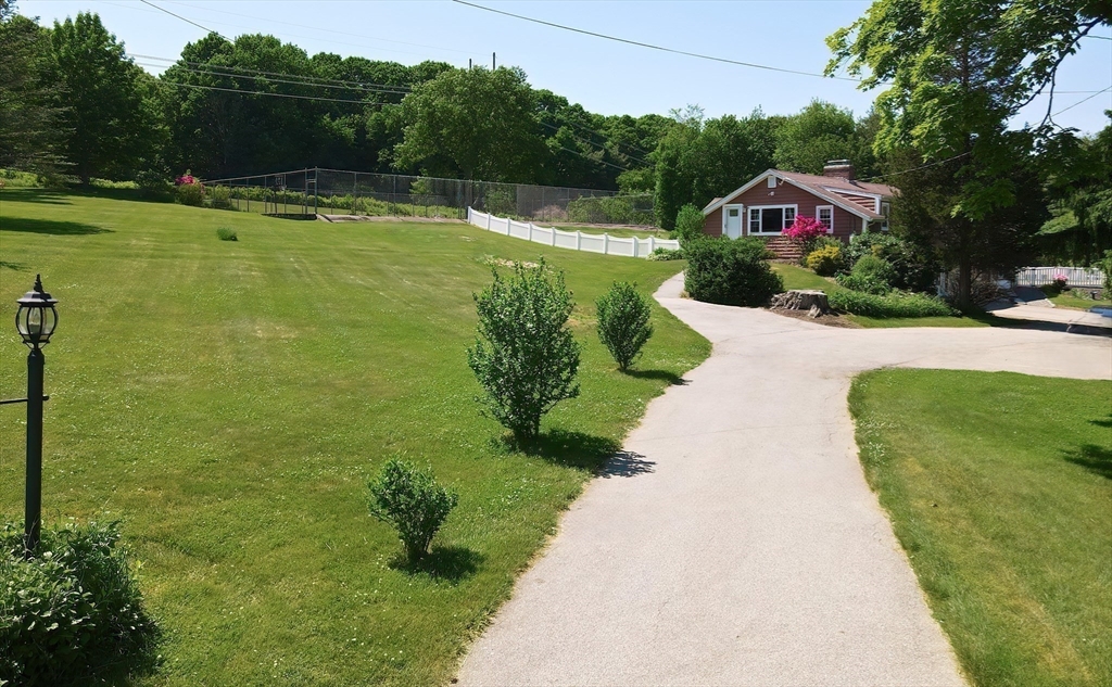 127 Haverhill Road Amesbury, MA 01913 - Photo 3 of 42 a view of swimming pool with a yard